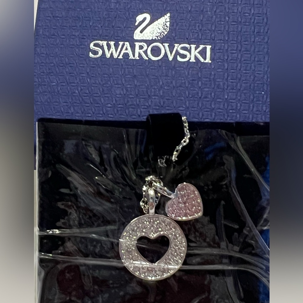 NEW authentic gorgeous Swarovski “2 HEARTS”necklace, comes in box
